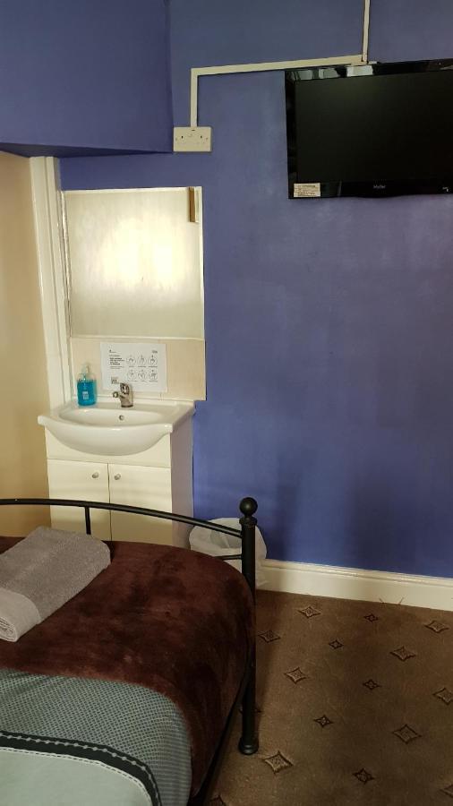 Chambre Triple avec Salle de Bains Commune