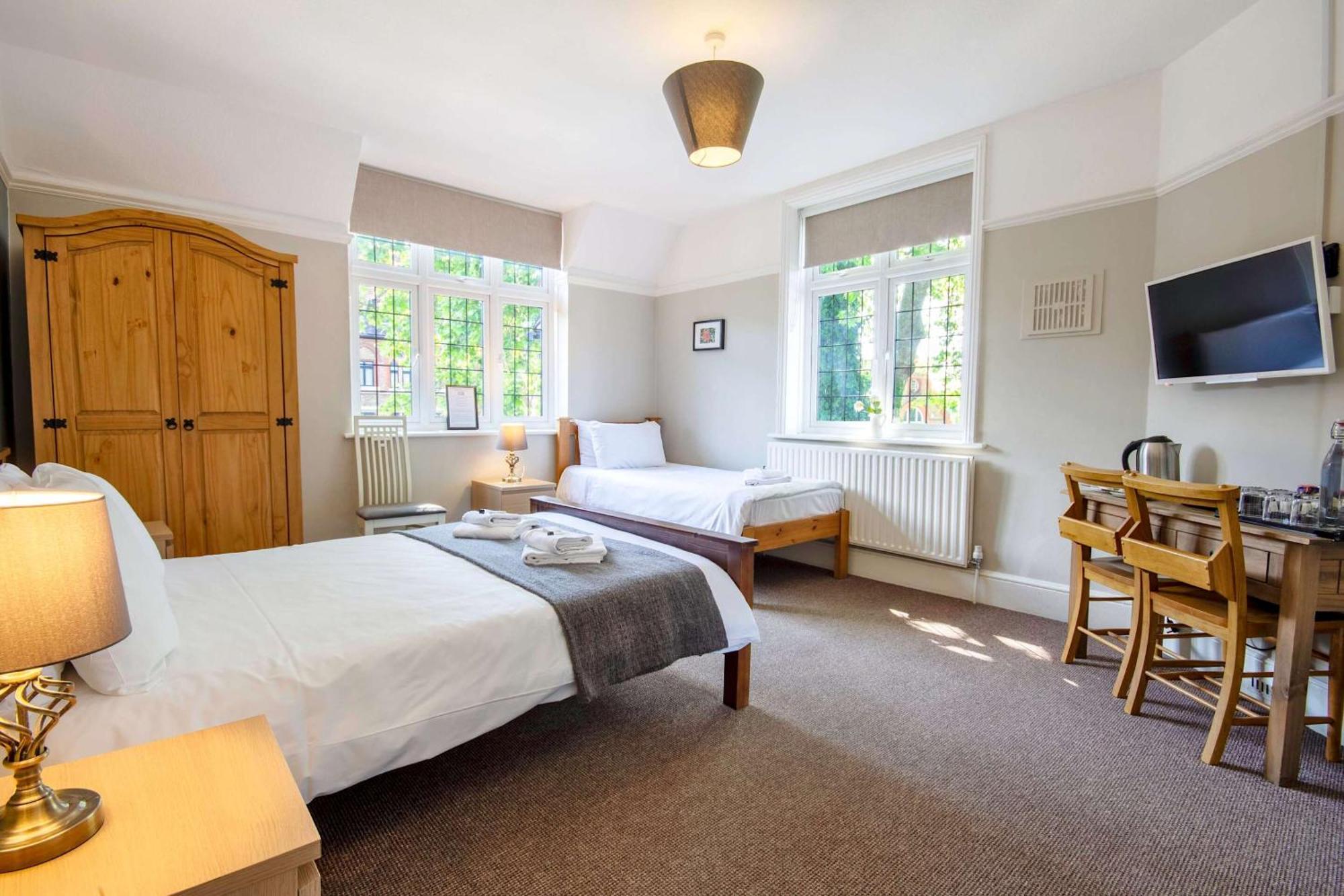 Chambre Triple avec Salle de Bains Commune